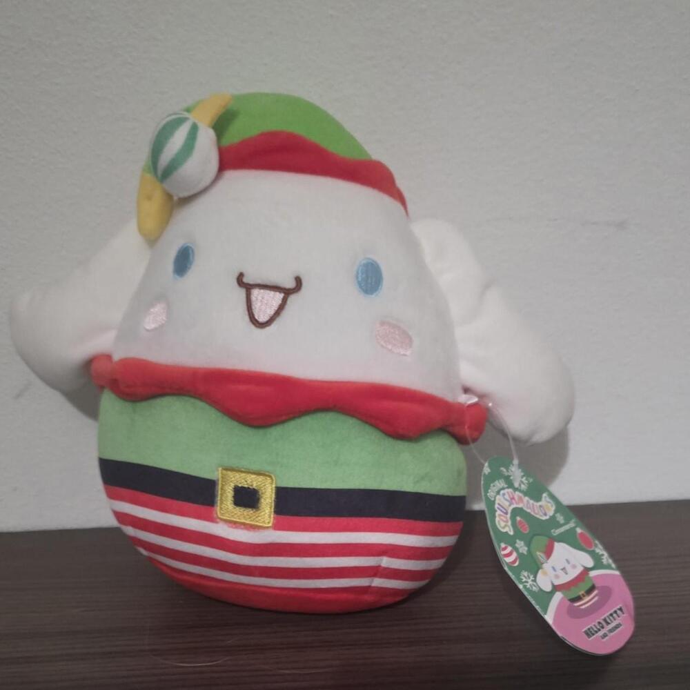 Sanrio Cinnamoroll Christmas Elf plush with red and green elf hat and striped pa